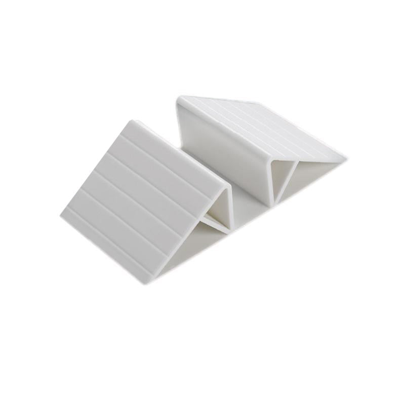 Base triangular de reforço entre a extensão para a barreira de segurança Monkey Mum®